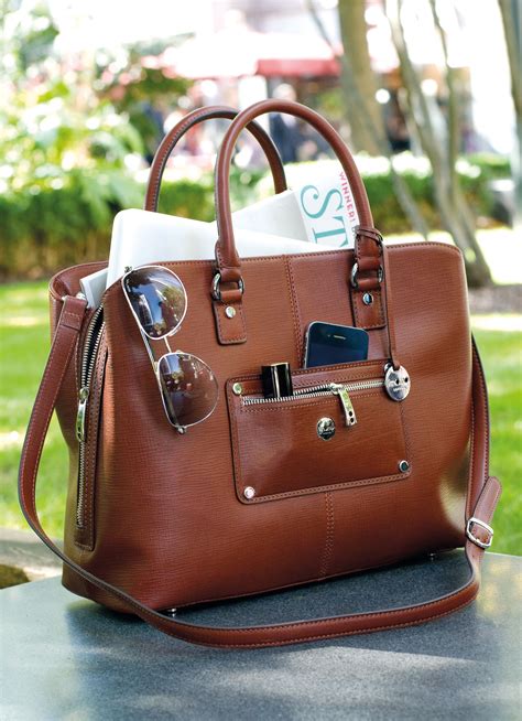 designer bags that fit laptop.